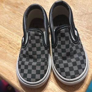 Black and gray checkered vans
